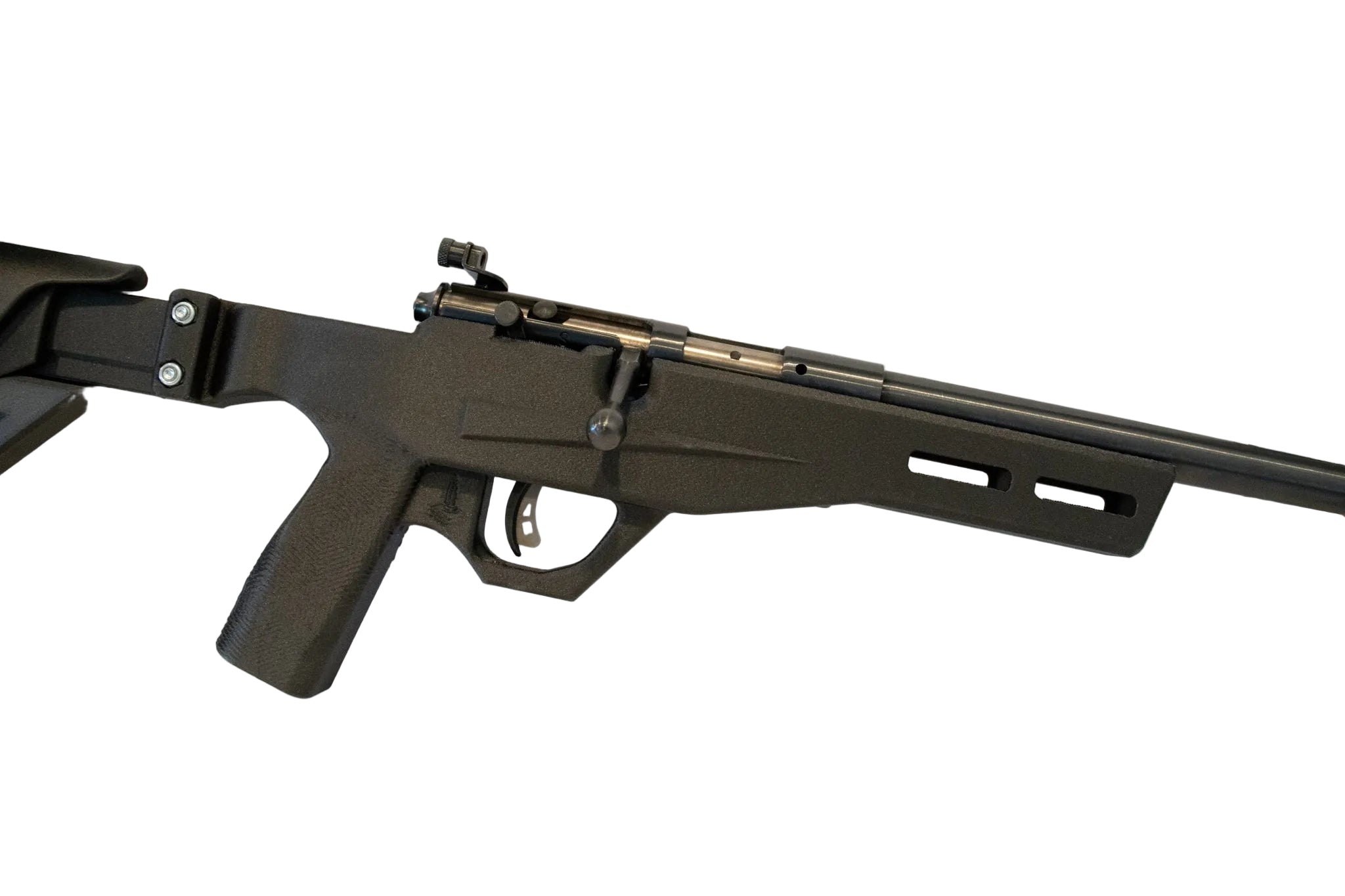 A black tactical rifle with a mounted scope, displayed horizontally on a white surface against a white background.