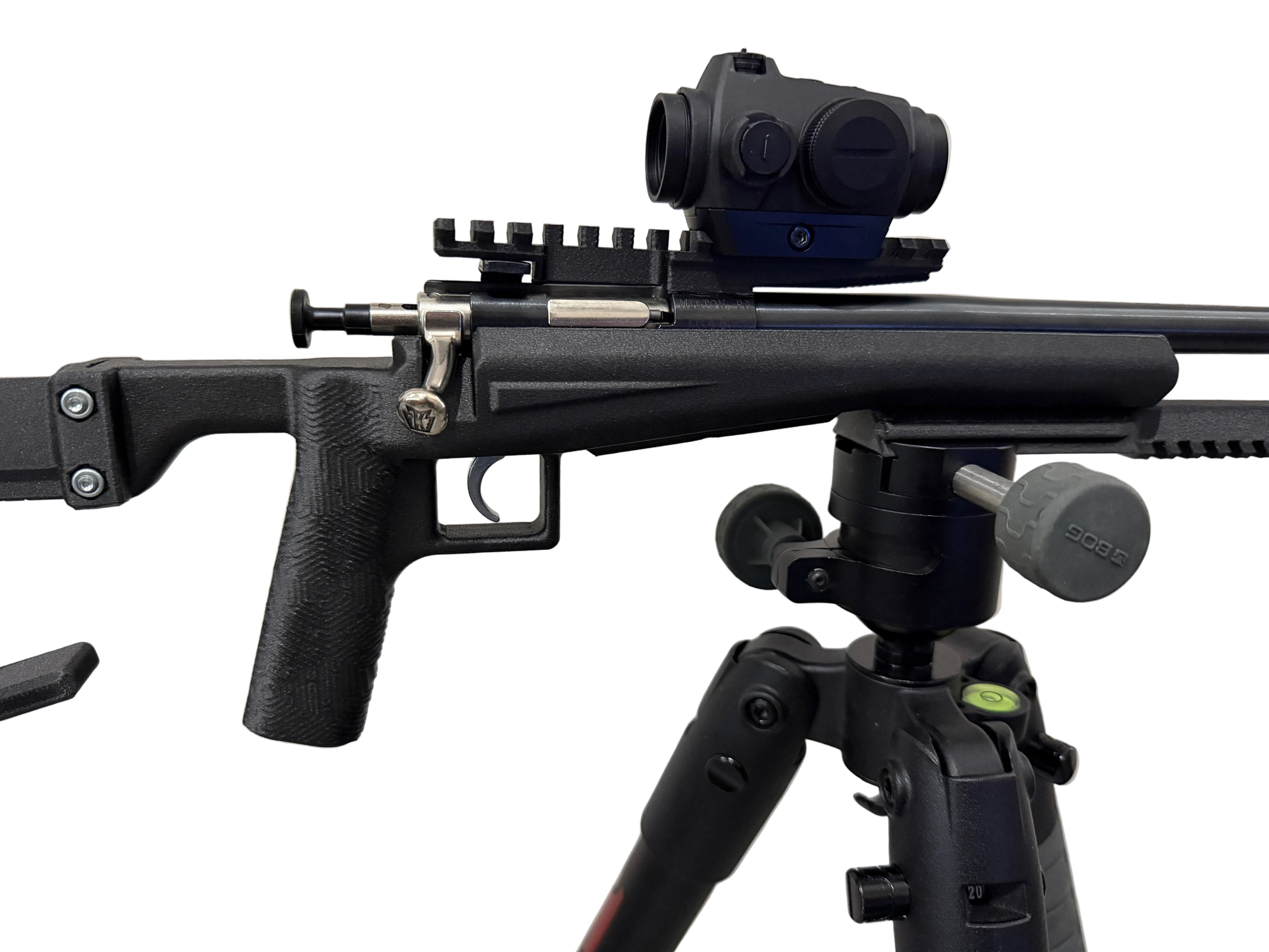 Black rifle with scope and tripod on a white background