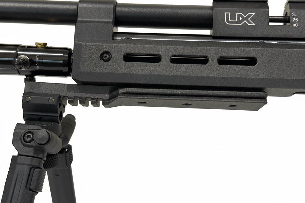 Close-up of a black rifle with 'UX' branding on a white background