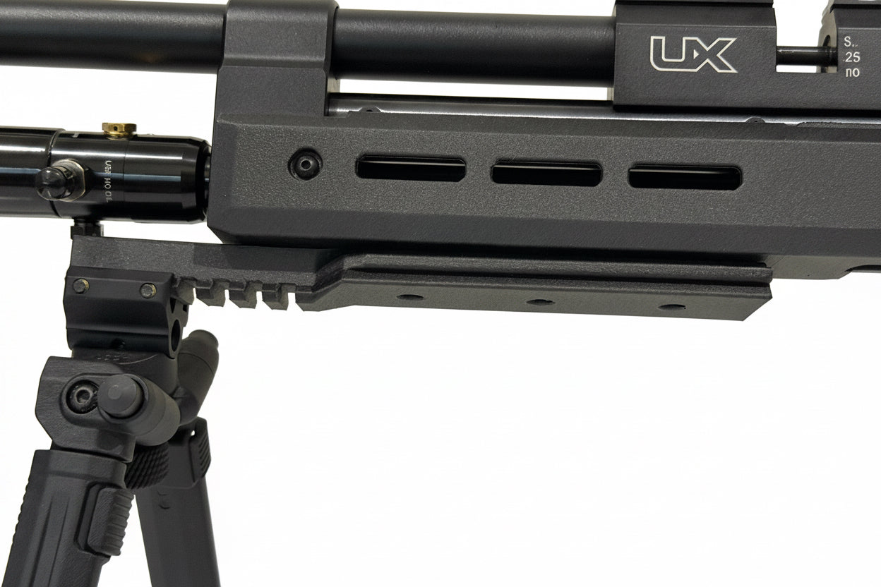 Close-up of a black rifle with 'UX' branding on a white background