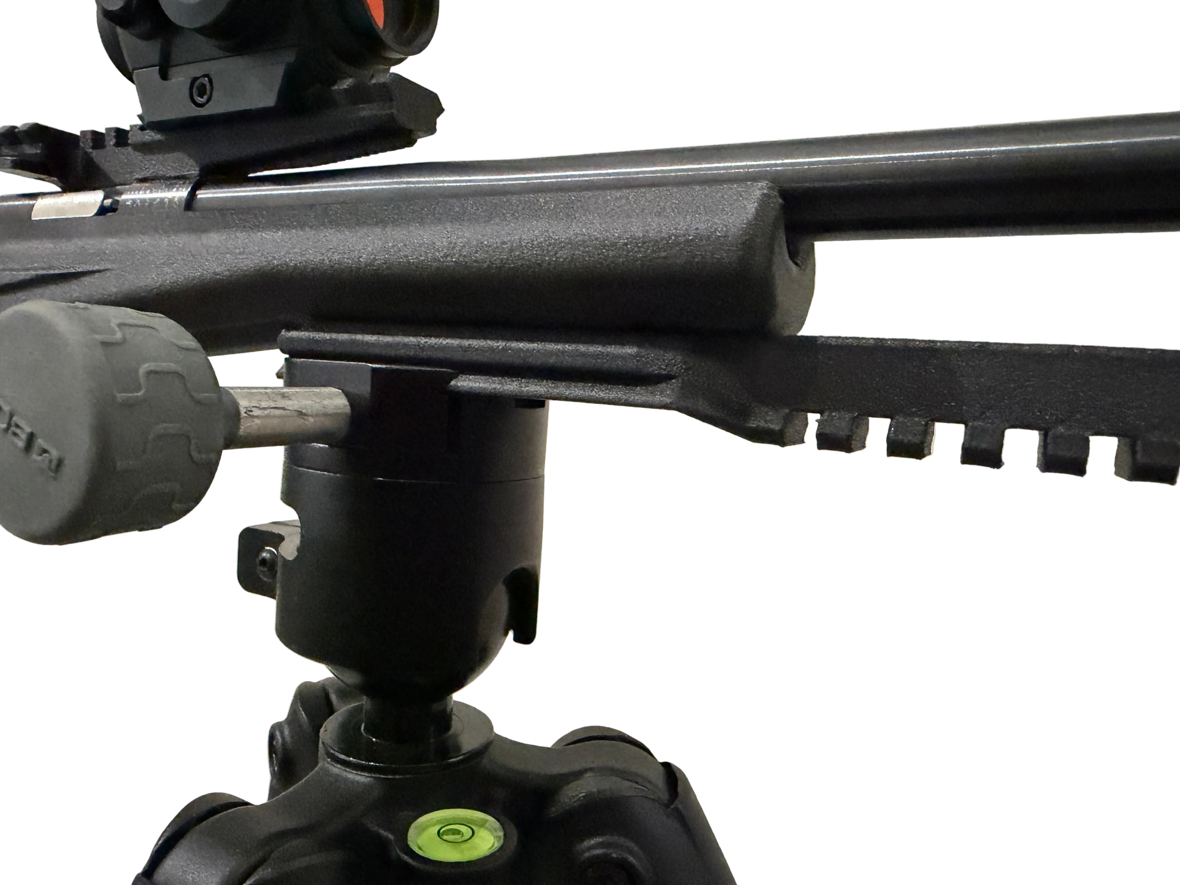 Close-up of a tripod with a level bubble on a plain background